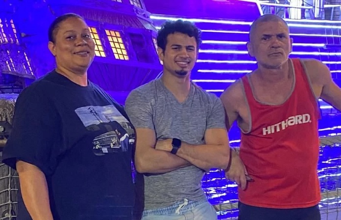 Rolando Romero with his parents