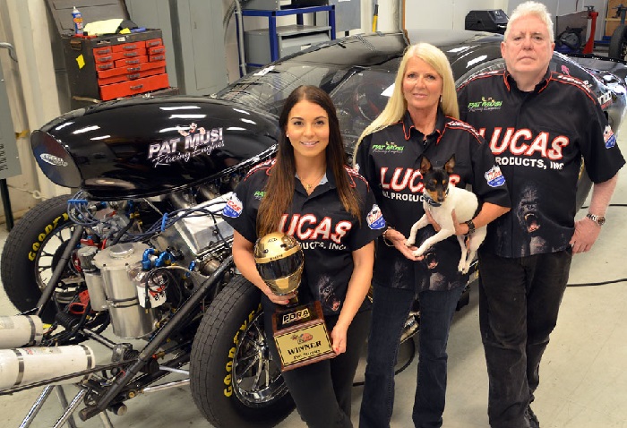 Lizzy Musi and her parents who are also drag racers