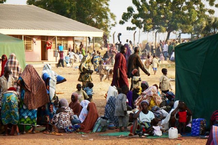 Civilians displaced by Boko Haram sit at a camp near Yola, the capital of northeast Nigeria's Adamawa state.