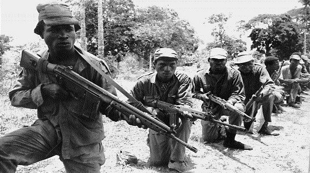Biafra soldiers carrying gun