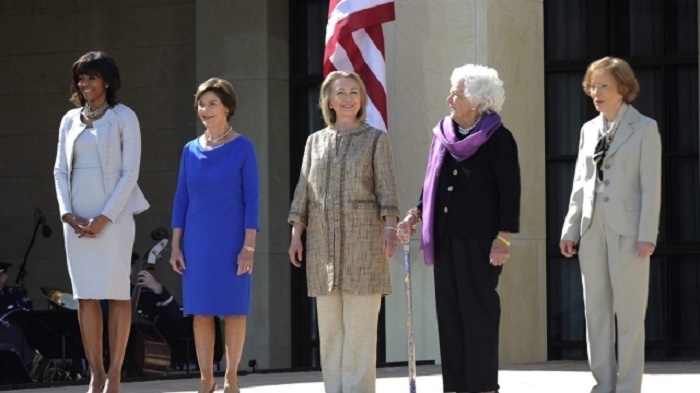 Michelle Obama posing with US former first ladies